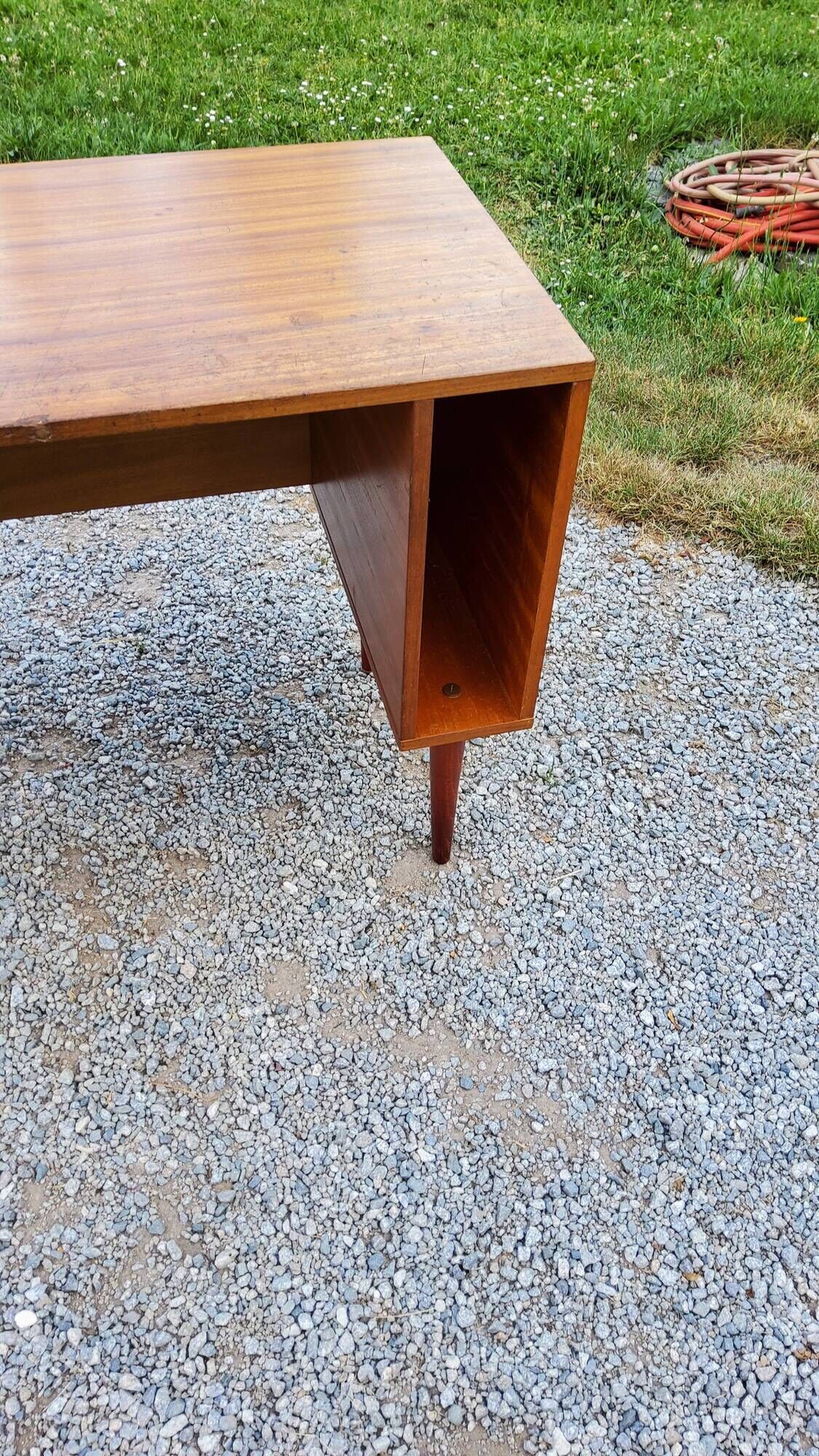 60s desk in golden blond mahogany with conical coffered feet