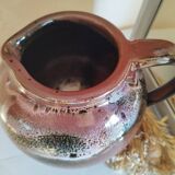 Stoneware pitcher by Matthieu Liévois in shades of red
