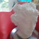 White plaster statue: man's head.