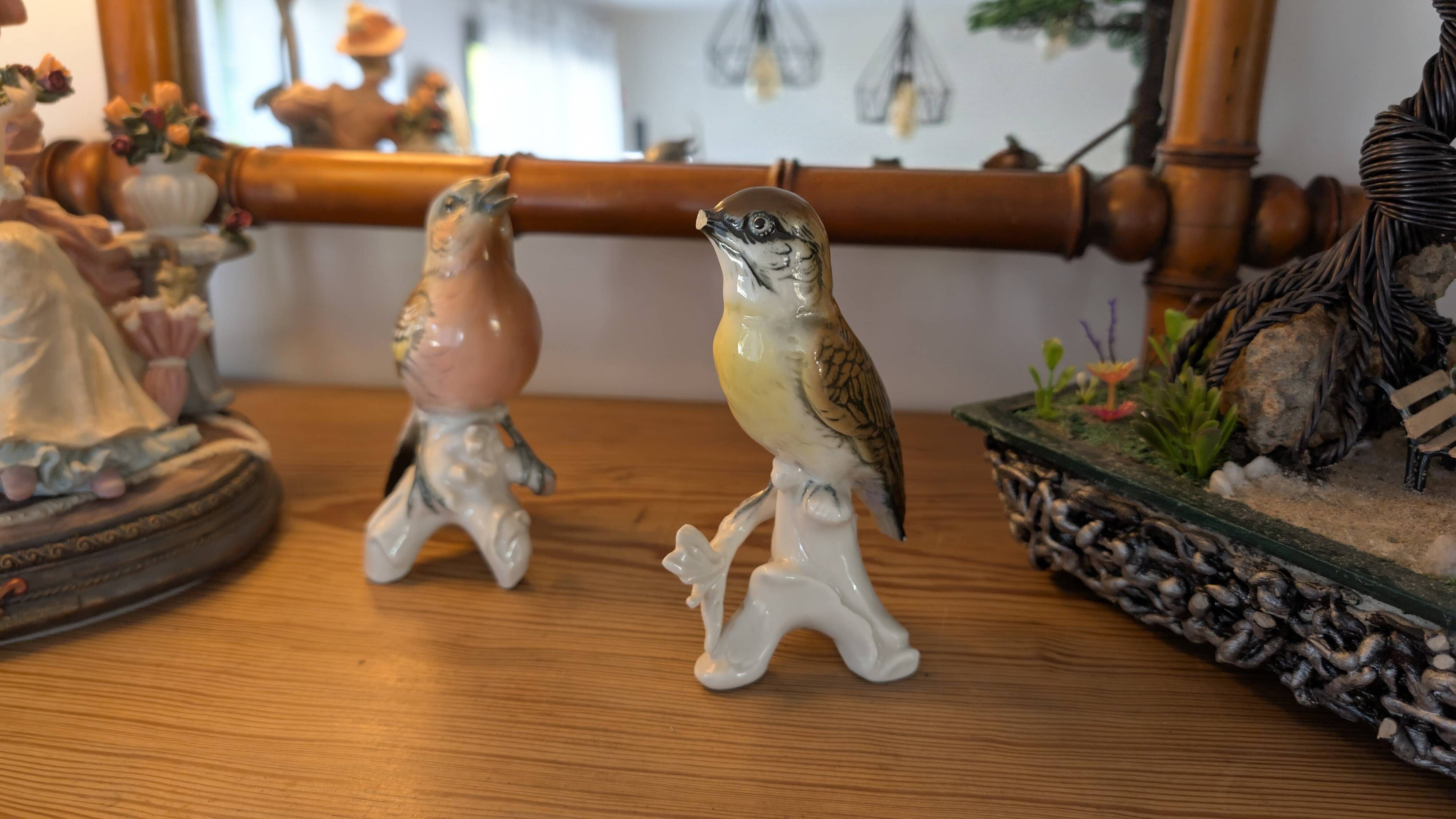 Pair of Karl Ens polychrome porcelain birds from Saxony