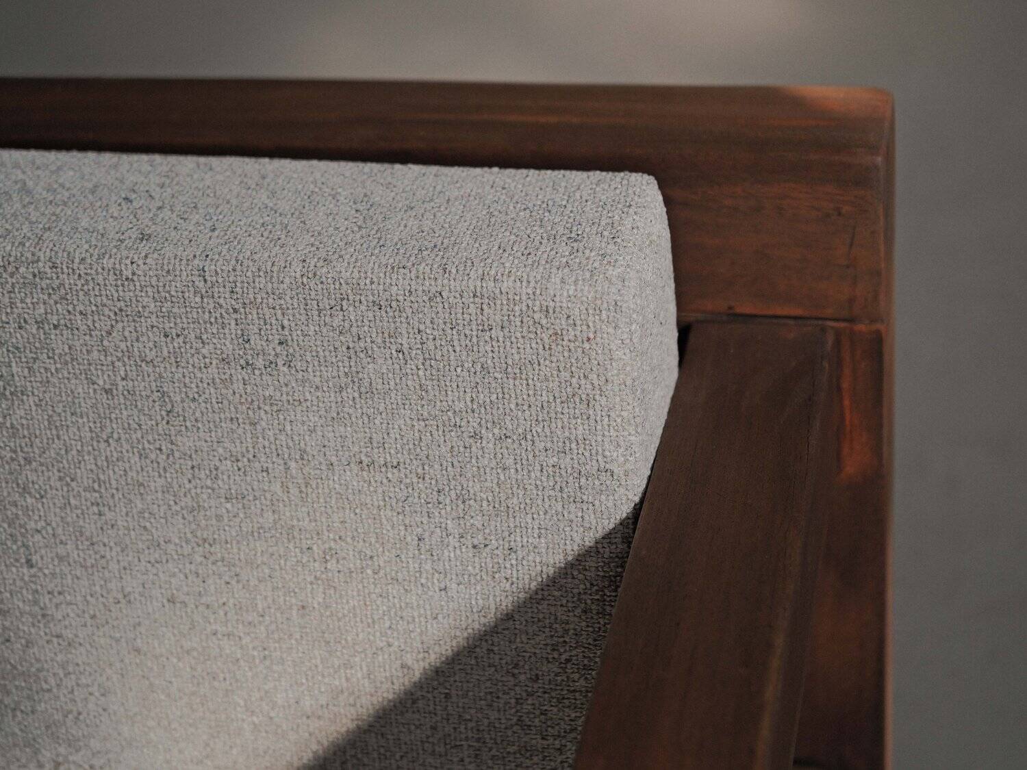 Handcrafted armchair in solid wood and fabric, 1980s-90s.