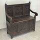 Chest bench in natural wood carved with Gothic motifs