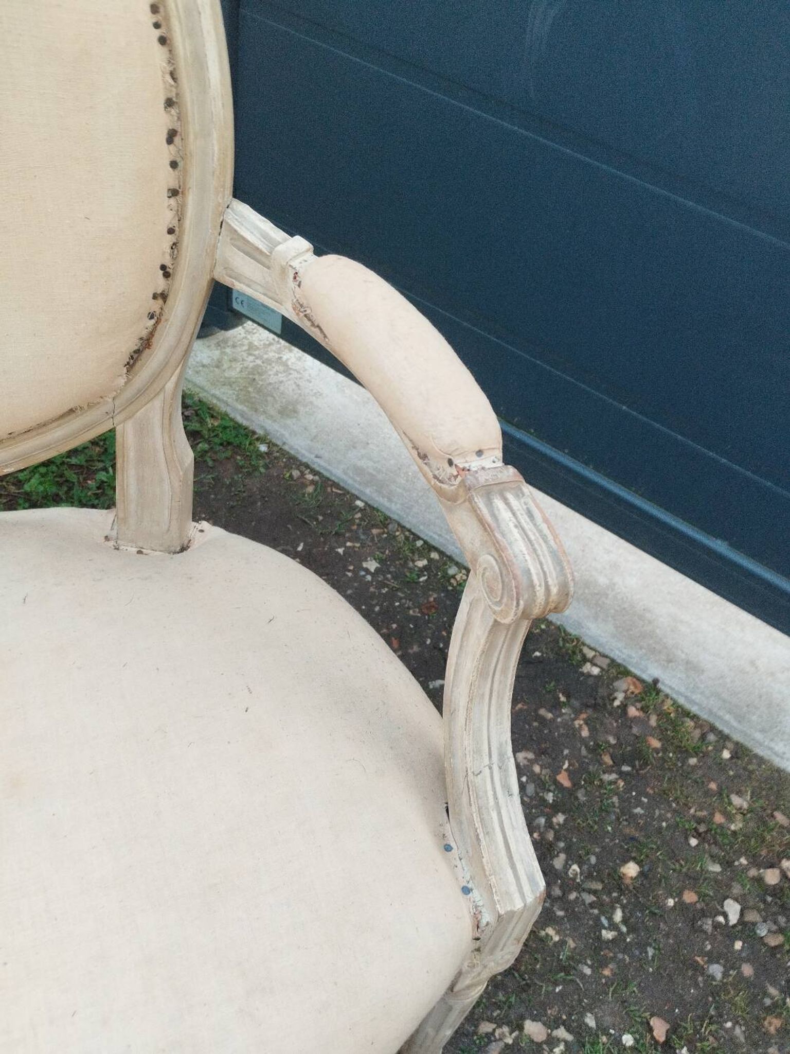 Antique armchair in Louis XVI style from the late 19th century.