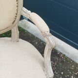 Antique armchair in Louis XVI style from the late 19th century.