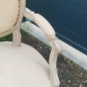 Antique armchair in Louis XVI style from the late 19th century.