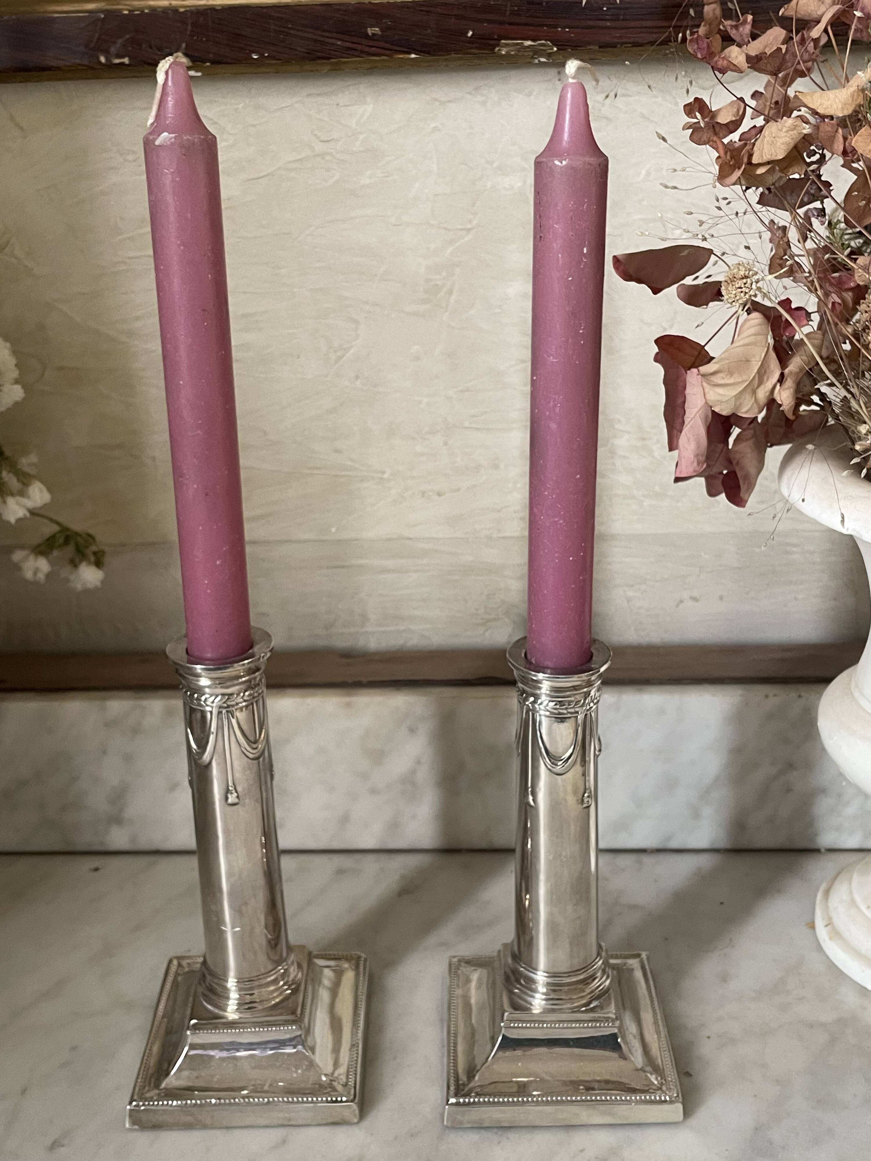 pair of Victorian style silver-plated candlesticks
