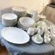 Prestigious 62-piece dinnerware set in vintage 70's Limoges white porcelain by Raynaud