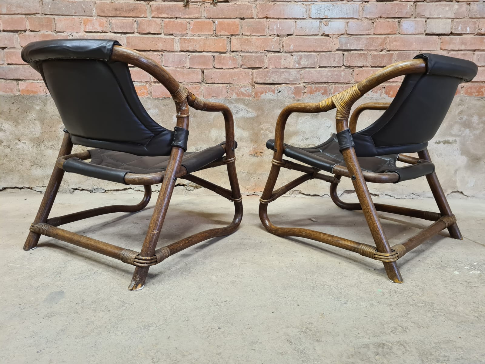 Pair of vintage skaï bamboo armchairs