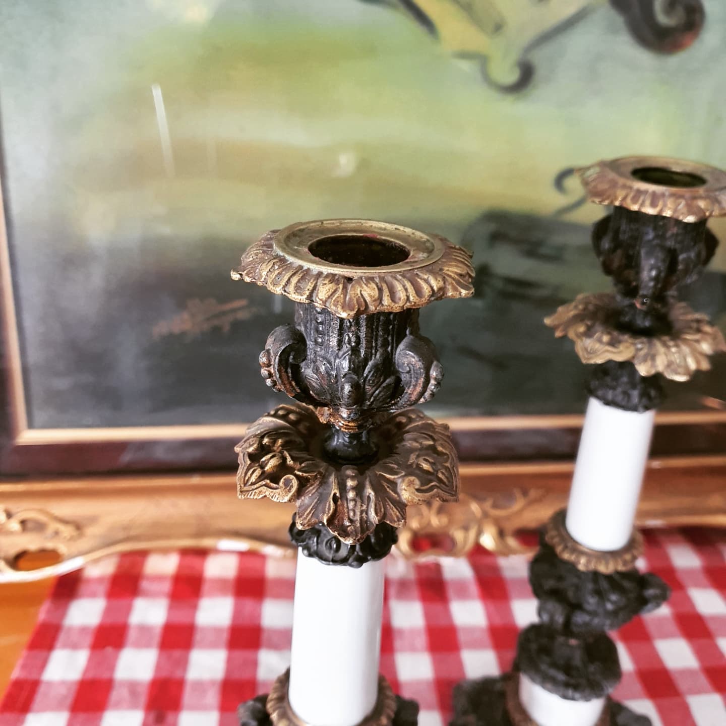 Pair of bronze and brass church candle holders