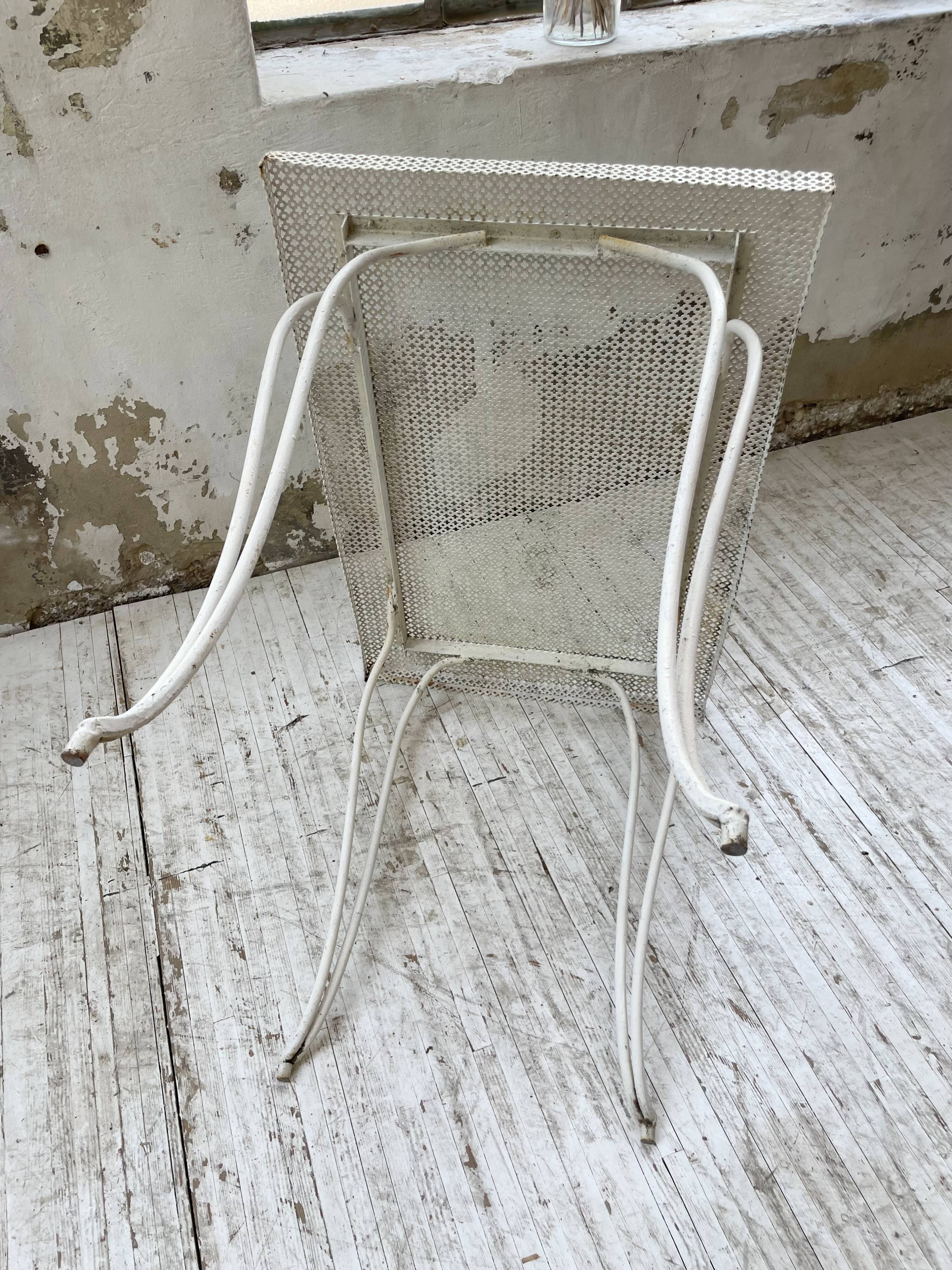 Perforated garden dining table