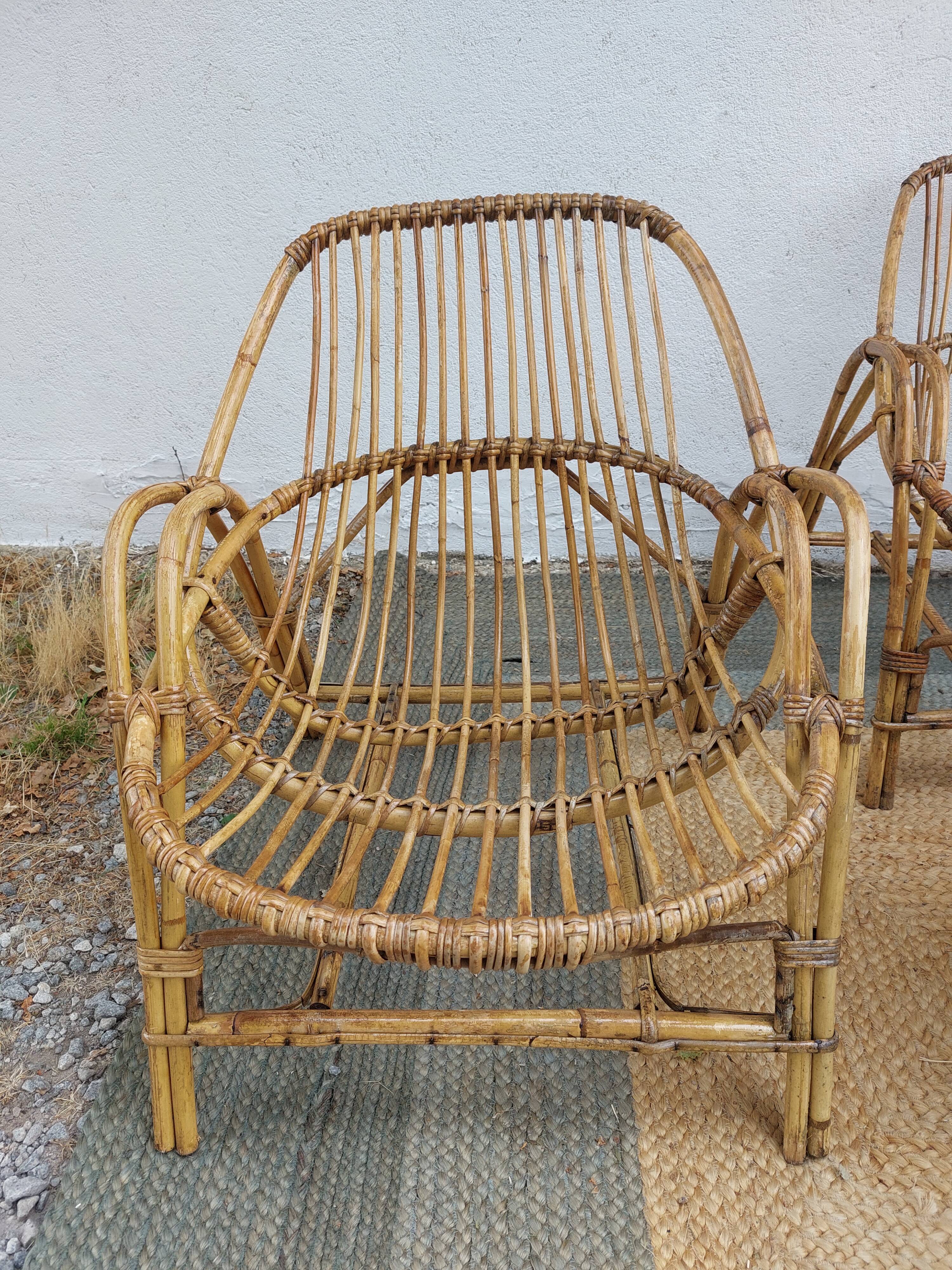 4 armchairs and a coffee table made of rattan and bamboo wood, vintage.