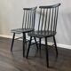 Set of 2 vintage black spindle wooden chairs