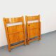 Pair of vintage folding chairs in pine from the 70s and 80s.