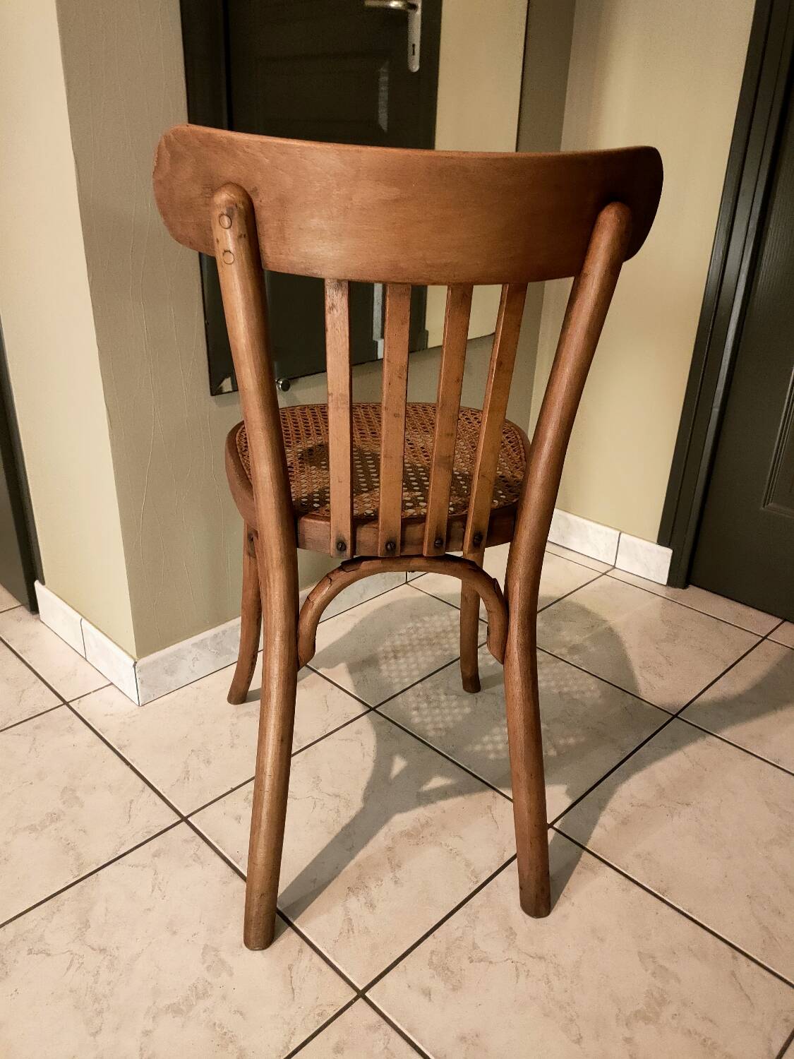Old bistro chair with caned seat