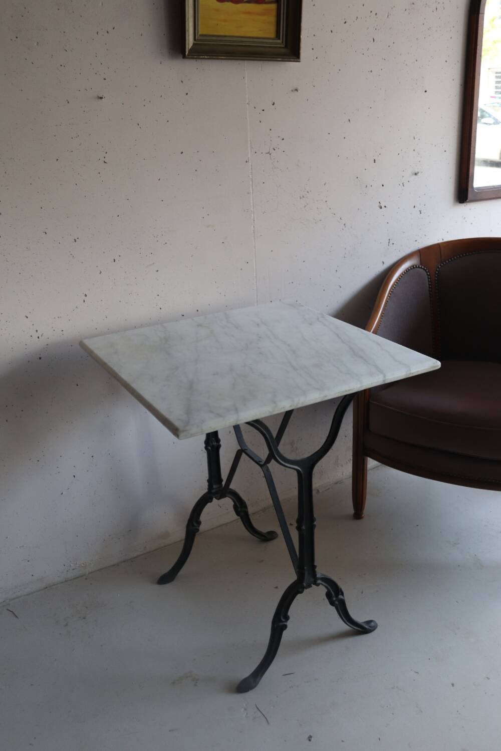 Square bistro table in white marble and cast iron