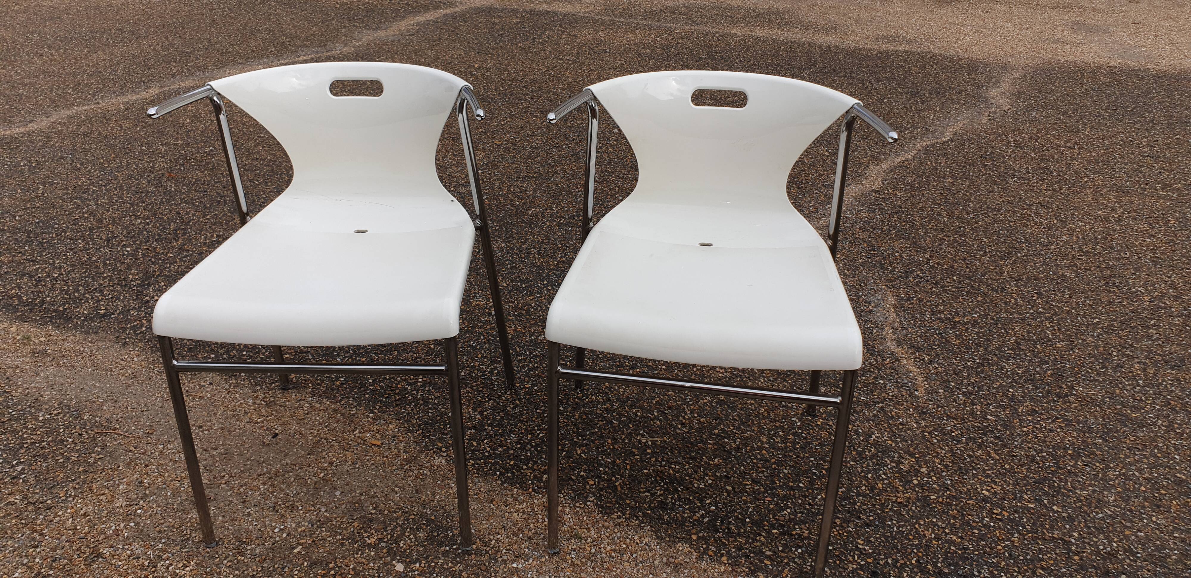 Pair of chrome and resin design armchairs