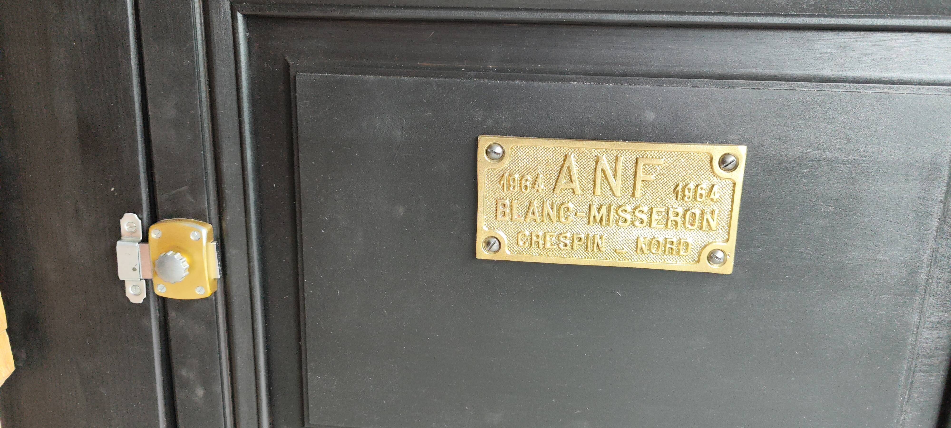 Old workbench furniture with six drawers and a door