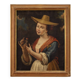 Painting portrait of a girl with a goldfinch from 18th century
