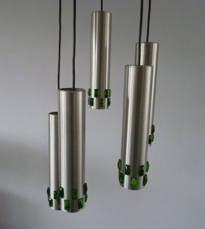 Suspension cascade of aluminum tubes with green glass