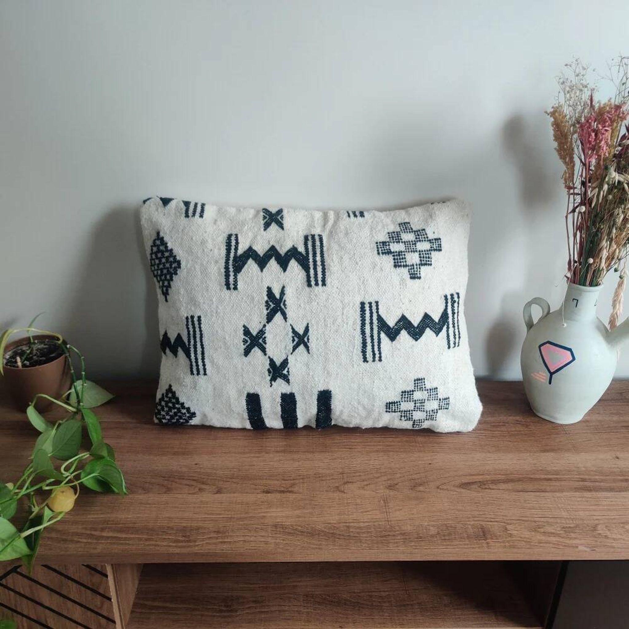 Moroccan kilim cushion in black and white.