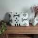 Moroccan kilim cushion in black and white.