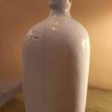 Triangular stoneware bottle