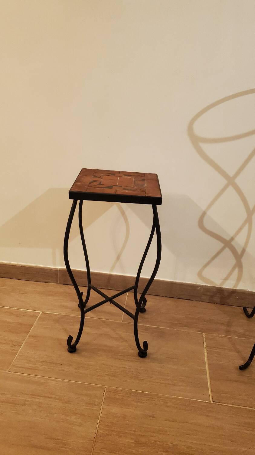 Wrought iron plant holder