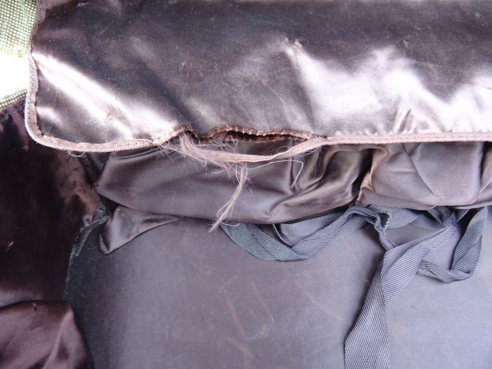 1930s Oshkosh suitcase with bakelite hangers