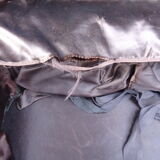 1930s Oshkosh suitcase with bakelite hangers