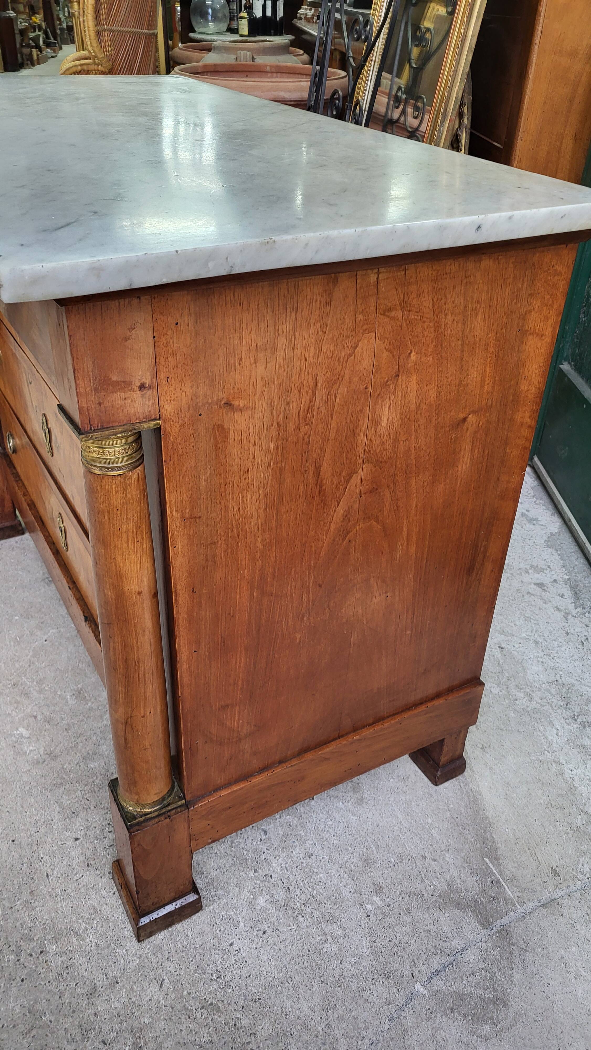 Empire commode in walnut with white marble top from the 19th century