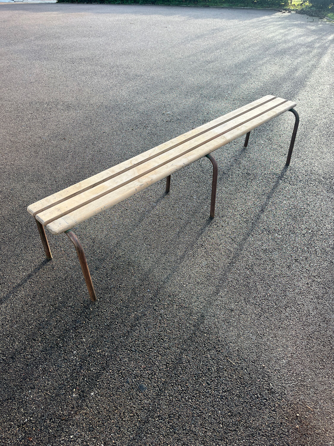 Large vintage school bench from the 1950s, made of wood and metal