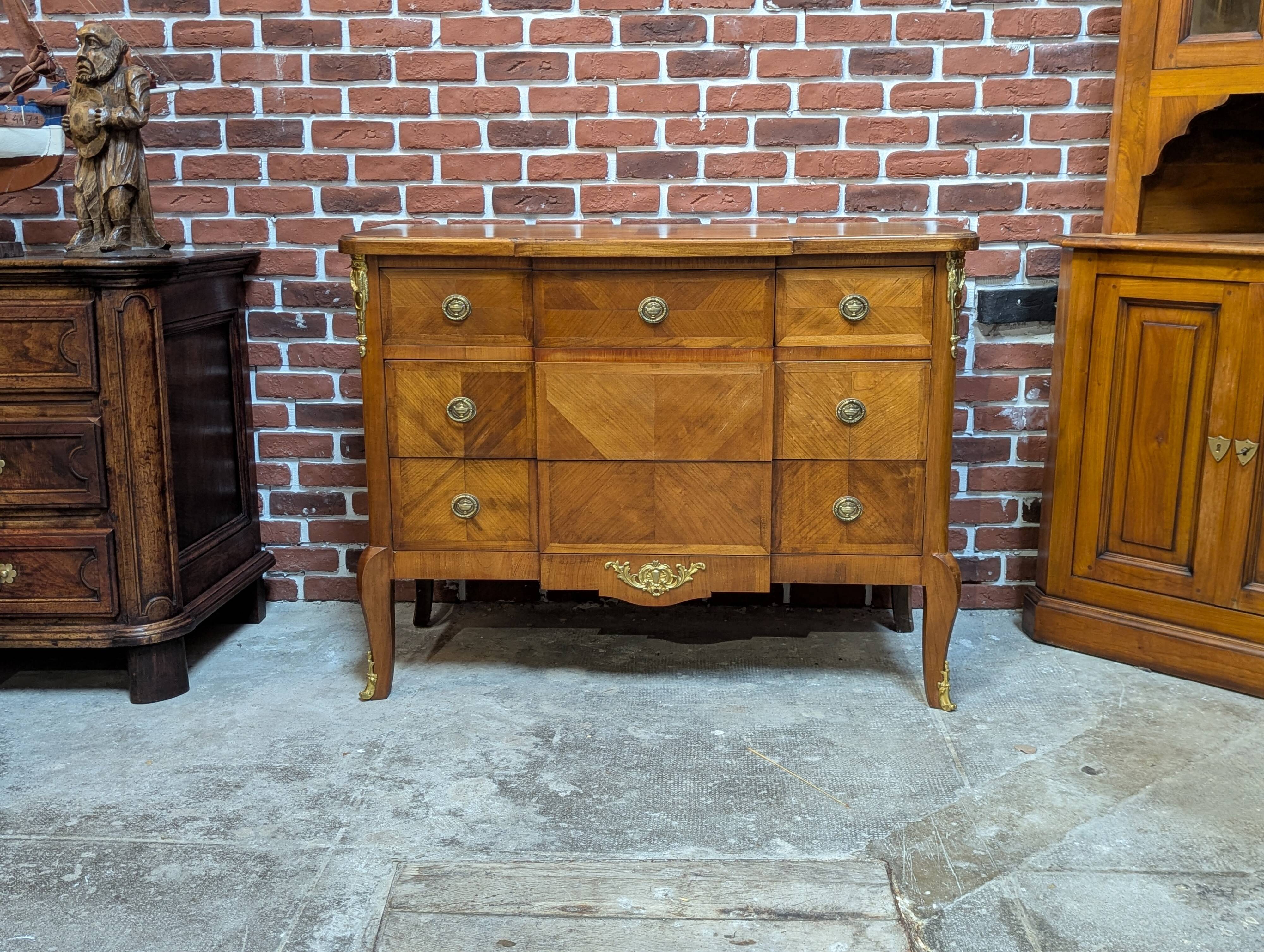 Transitional style inlaid chest of drawers