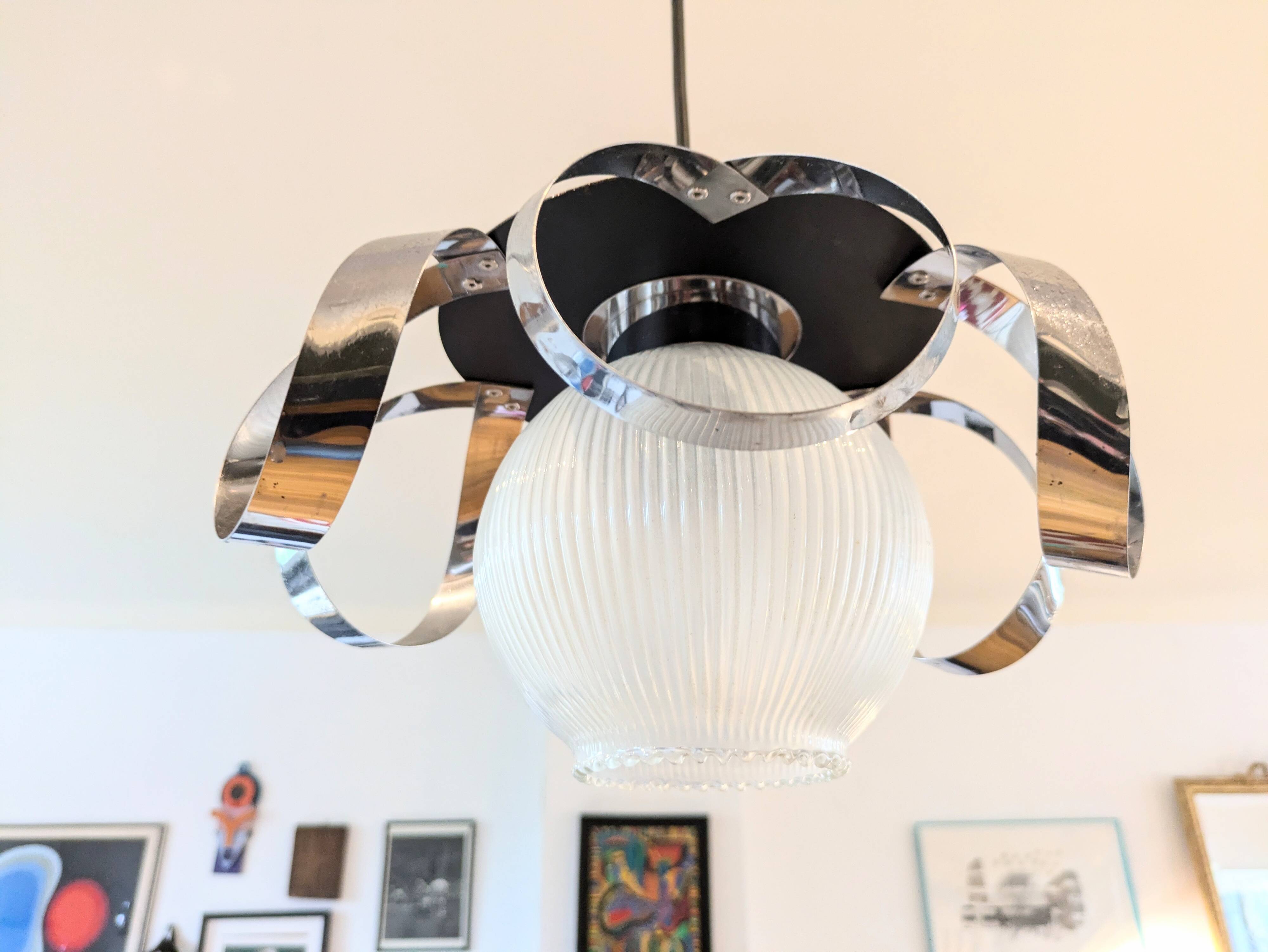 Space Age stainless steel and glass pendant light from the 70s