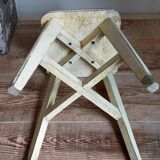 Old workshop stool in patinated solid wood