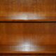 Open library Bradley Furniture made of yew wood with a cupboard base.