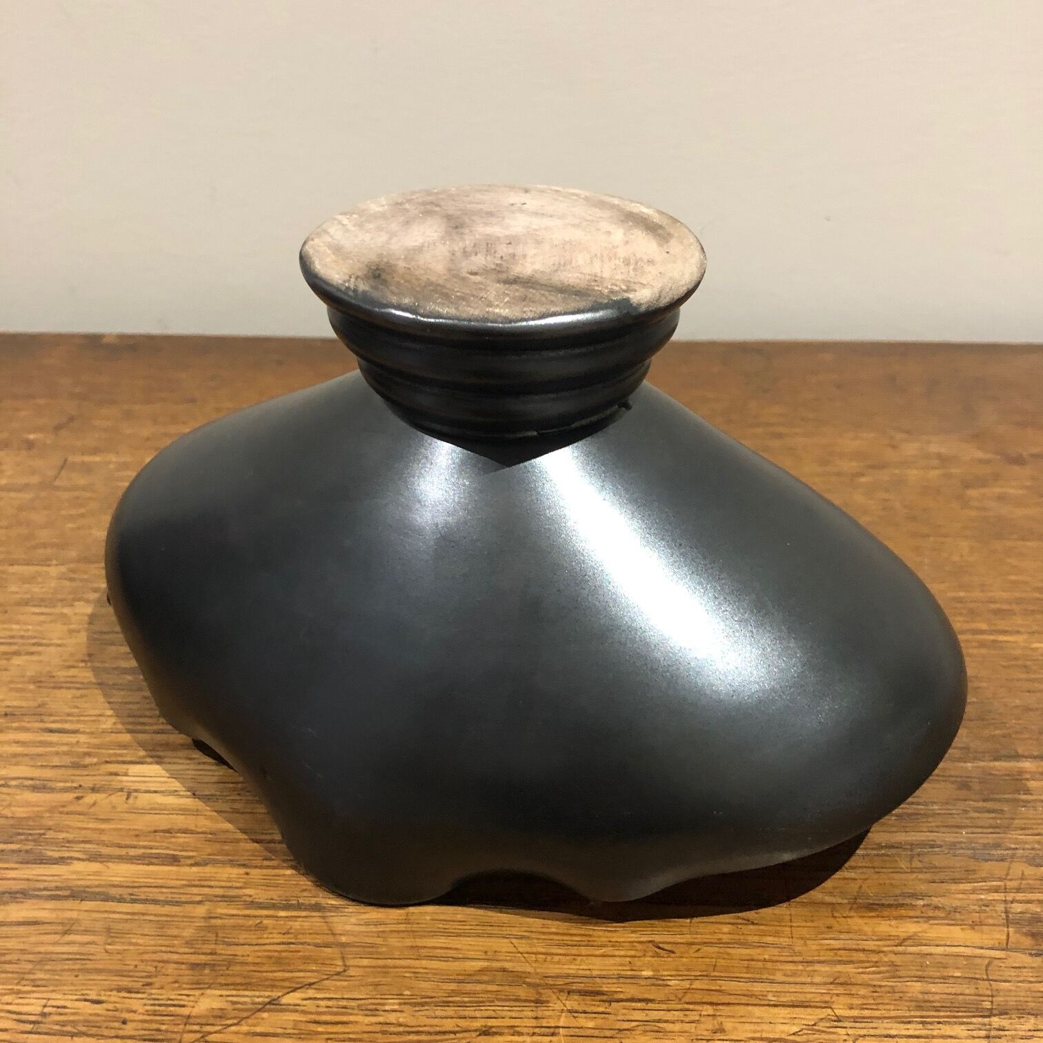 Red and black trinket bowl of the 50s