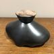 Red and black trinket bowl of the 50s