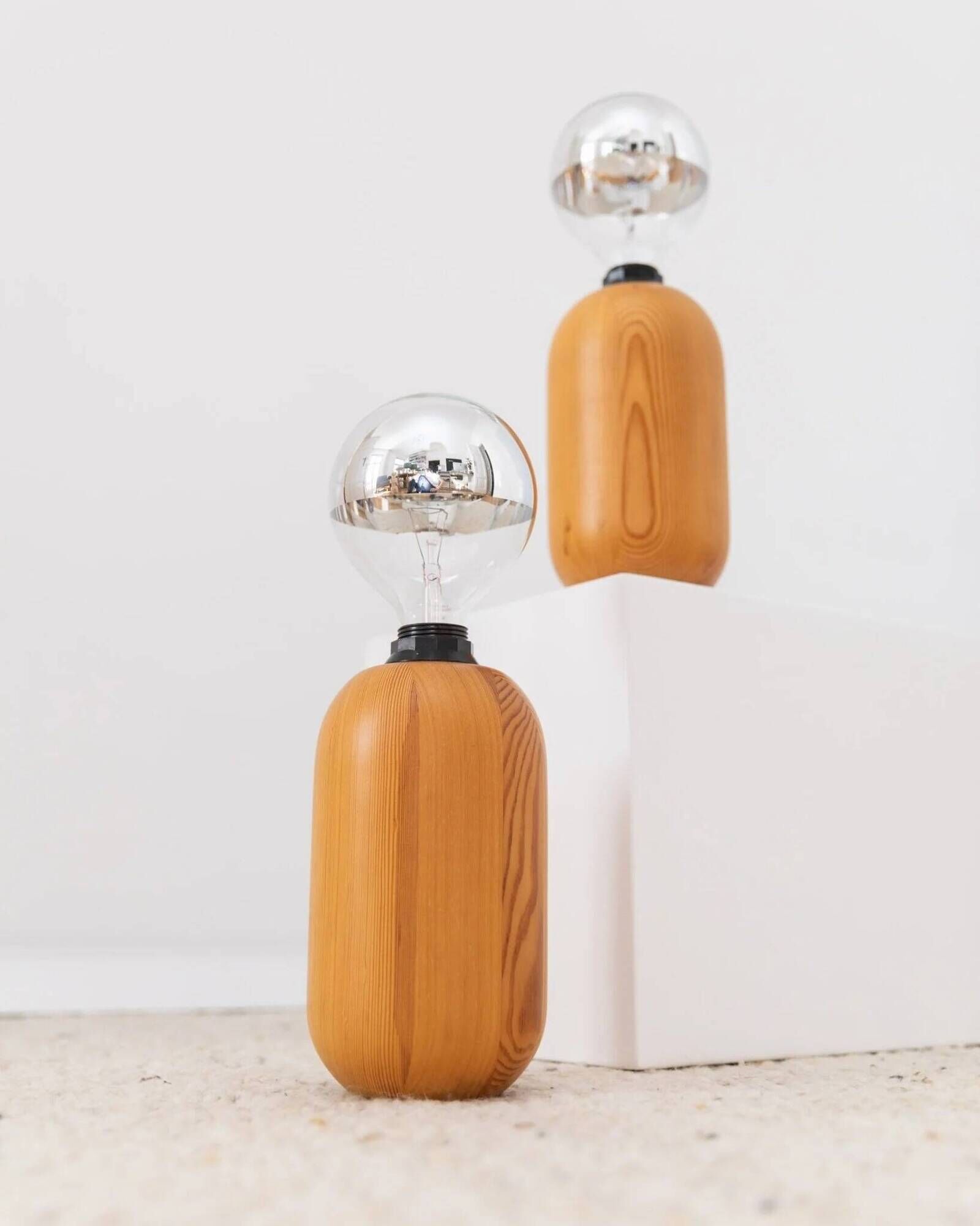 Pair of XXL Domus table lamps in marron wood with chrome globe bulbs