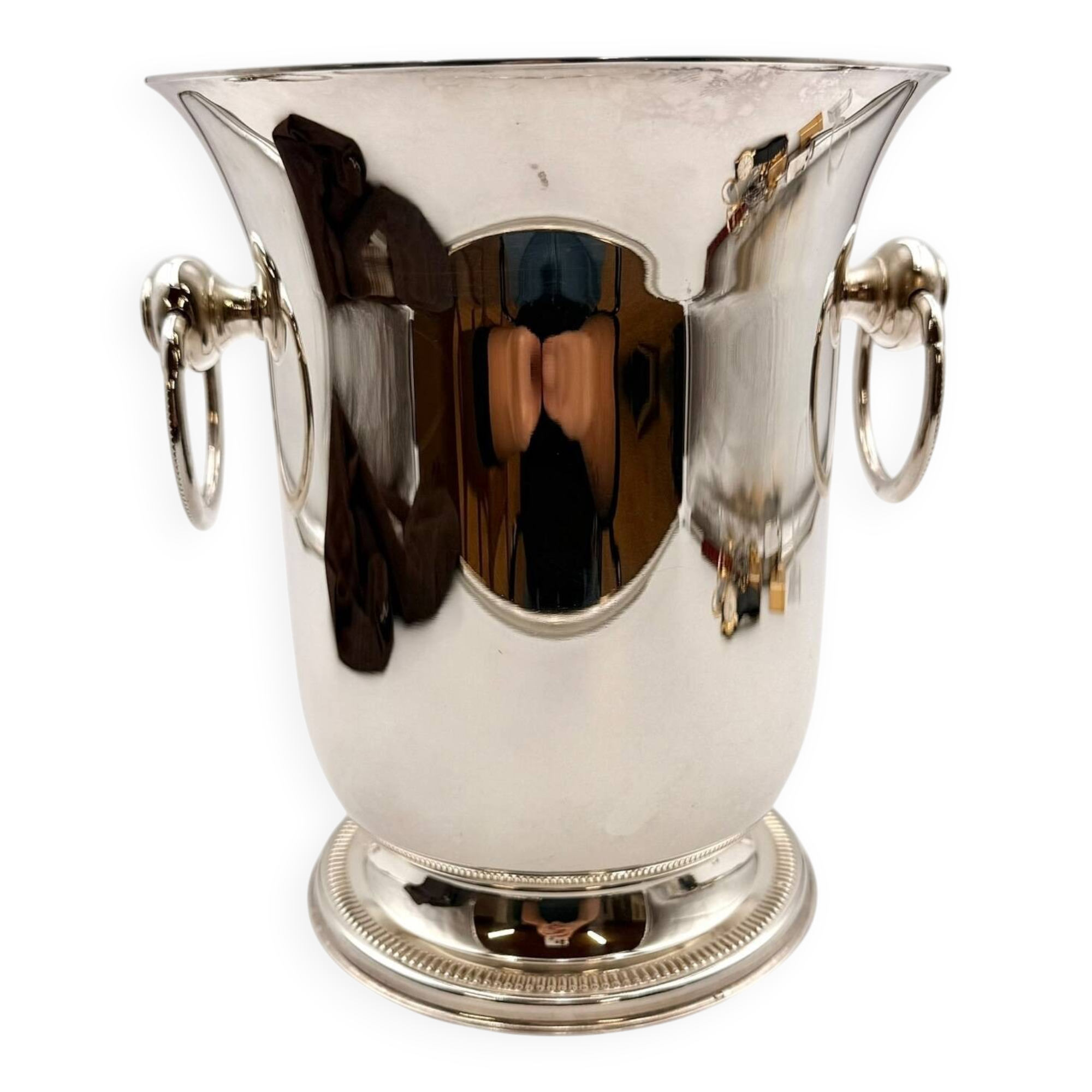 Silver-plated champagne bucket with ring handles.