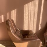 Pair of vintage armchairs in brown imitation leather