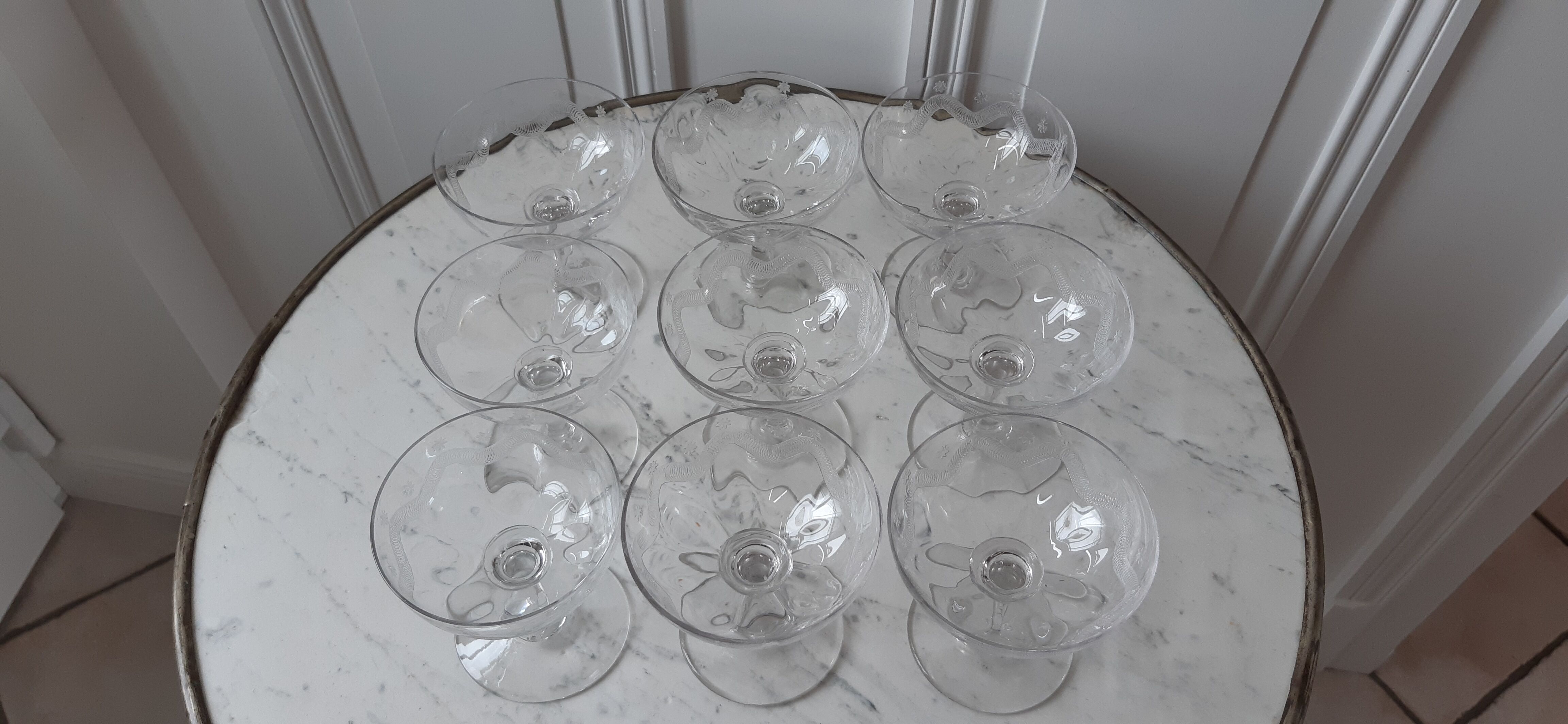 Set of 9 champagne glasses in crystal engraved XIXth