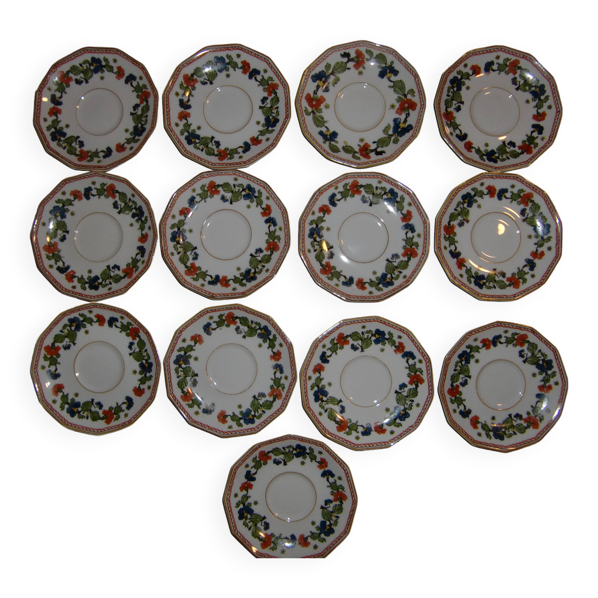 Set of 13 small porcelain snack plates from the 50s