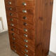 Old apothecary trade furniture in vintage wood 24 drawers.