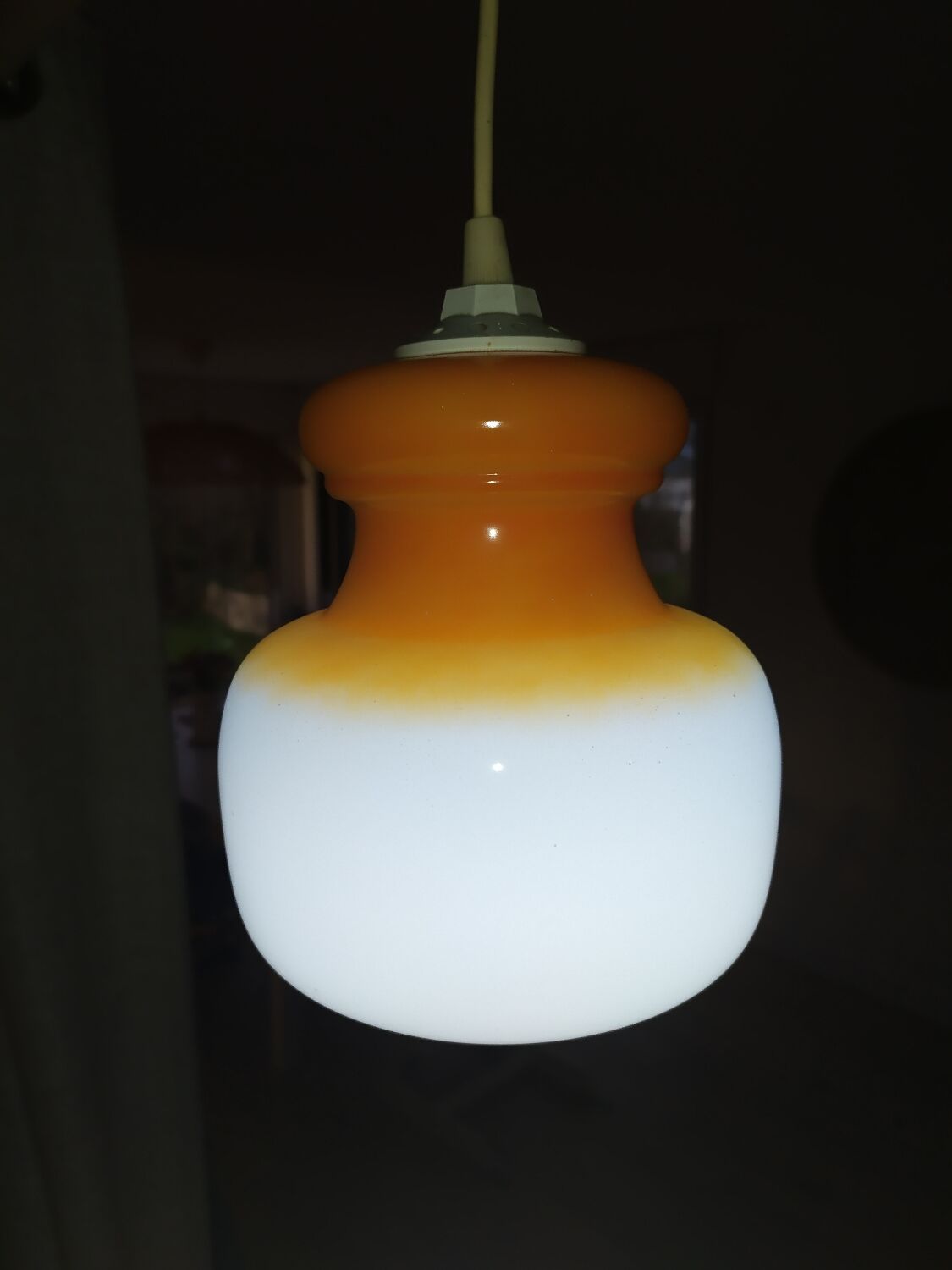 Pendant light in orange and white opaline