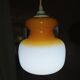 Pendant light in orange and white opaline