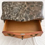 Curved Louis XV style commode in marquetry, veined marble and ornamentation.