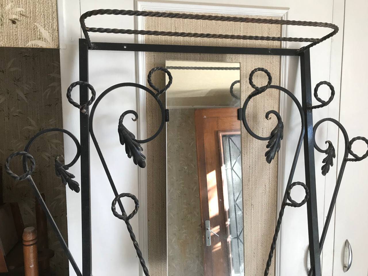 Wrought iron coat rack and shelf