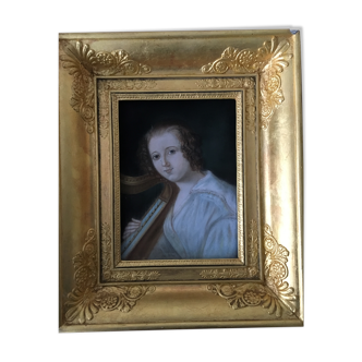 Portrait of woman with harp