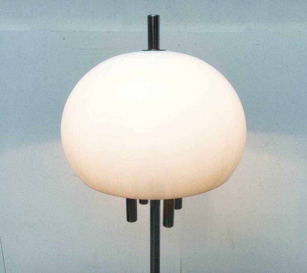 Italian space-style floor lamp from the 1960s with a stone base.