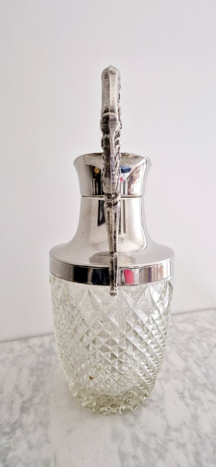 Glass and silver-plated carafe